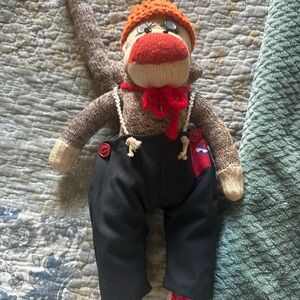 Handmade Sock Monkey Toy with Red and Brown Accents